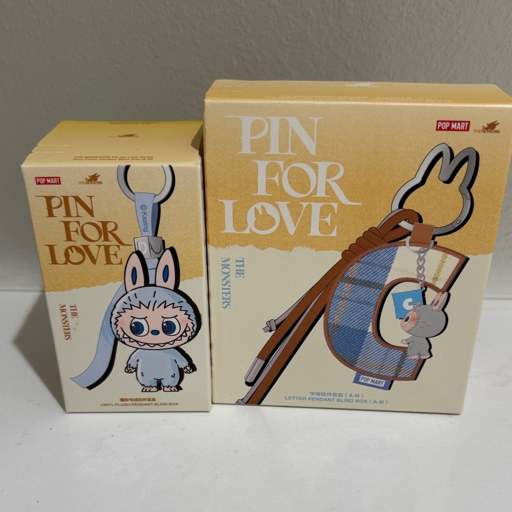 Pin for Love Plush and letter pendant set brand new in box (?)